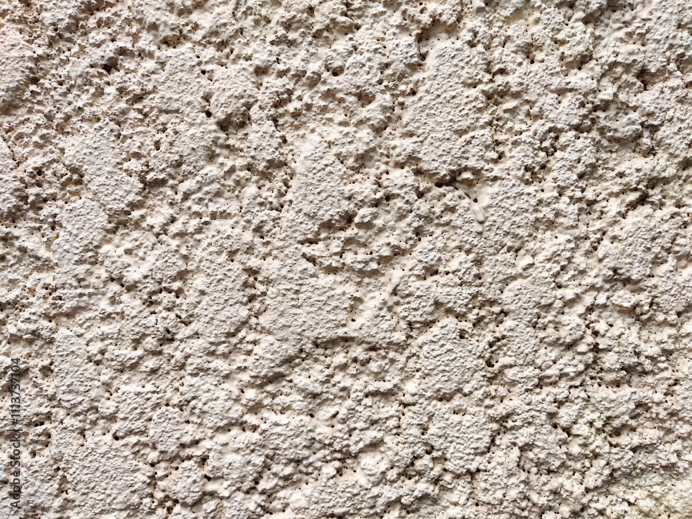 Textured wall surface with a rough finish suitable for displaying information or art Textured wall surface with a rough finish suitable for displaying information or art
