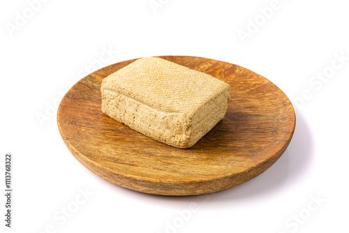 Tofu Cheese Isolated, Smoked Vegan Cheese Slice, Sliced Soya Bean Curd, Soy Protein or TSP photo