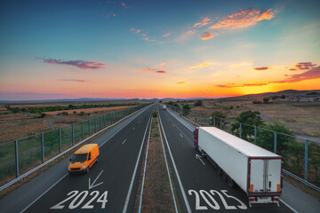Happy New Year 2025 conccept. Driving on open road at beautiful sunset. Aerial view
