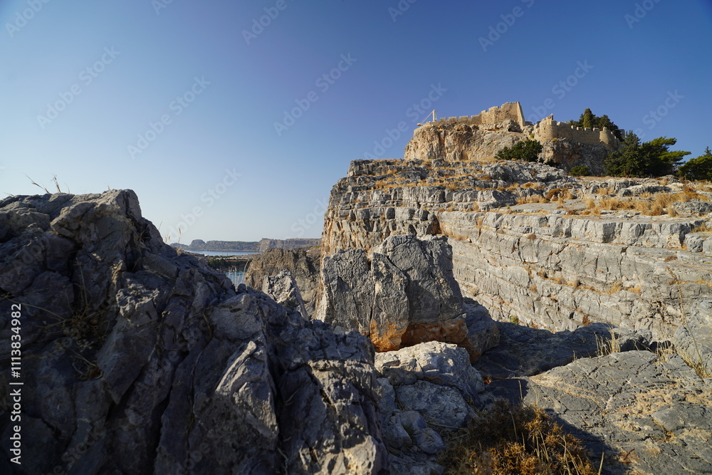 Fototapeta premium acropolis of Lindos and rocky cliffs
