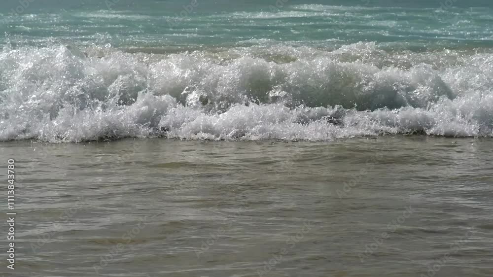 Close-up of ocean waves. Concept of travel, relaxation, and natural beauty. Perfect for content about beach holidays, adventures, and eco-tourism. Close-up of ocean waves. Concept of travel, relaxation, and natural beauty. Perfect for content about beach holidays, adventures, and eco-tourism.