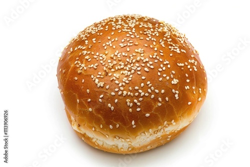 Freshly baked hamburger bun with sesame seeds on white background.