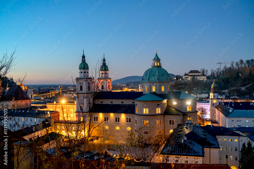 Fototapeta premium Beautiful ancient Salzburg Cathedral, Christmas illumination in the evening. Christmas holiday in Europe 
