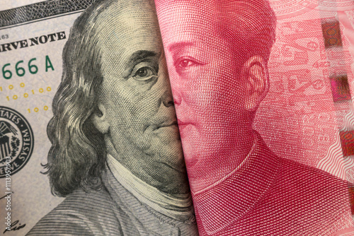 Obraz na płótnie America dollar and Yuan banknote with USA and China flags. Its is symbol for tariff trade war crisis between biggest economic country in the world. w salonie