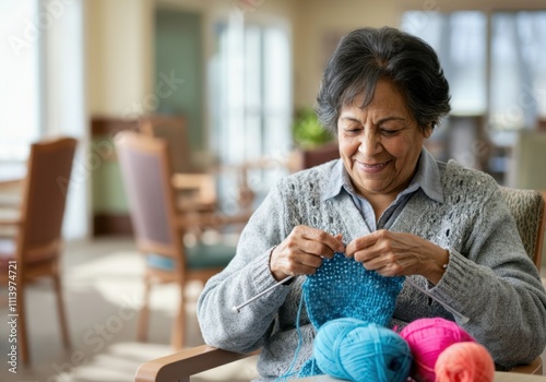Elderly woman enjoying her retirement hobby, knitting with colorful yarn in a relaxed setting