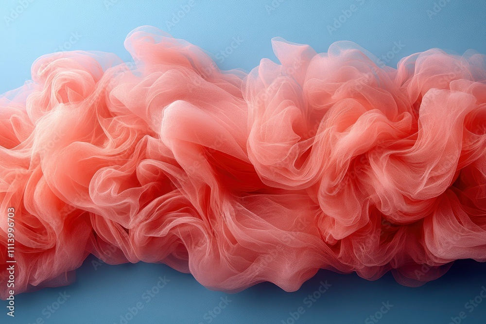 Fototapeta premium Abstract Coral Tulle Fabric Swirl on Blue Background