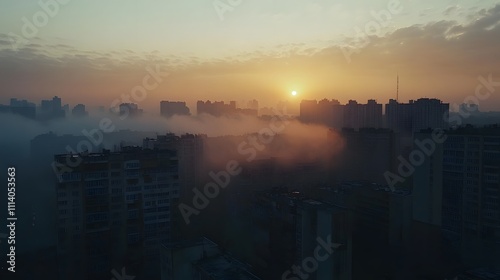 Misty morning envelops hillside village