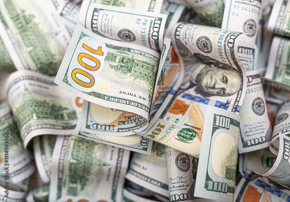 100 dollar bills as abstract background.