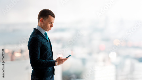 Successful smiling ambitious caucasian european businessman lawyer in suit standing in light office with laptop and phone