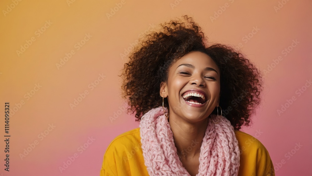 Happy optimistic African American woman in colorful pink clothes laughing isolated on yellow background Happy optimistic African American woman in colorful pink clothes laughing isolated on yellow background