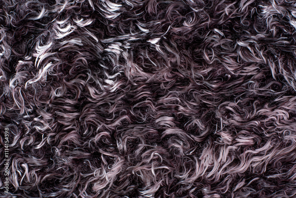 Close-up shot of gray fur. This image is ideal for website backgrounds, social media posts, and marketing materials. Close-up shot of gray fur. This image is ideal for website backgrounds, social media posts, and marketing materials.