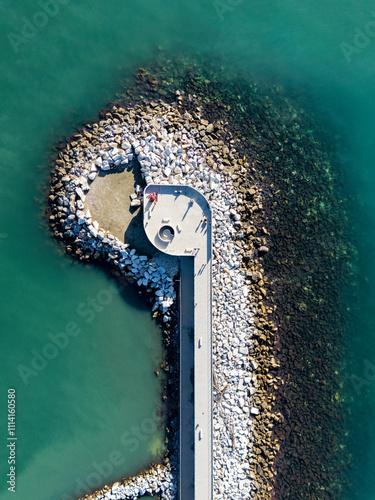 Aerial view of the new waterfront built on the breakwater of the commercial port of Marina di Carrara, in Tuscany