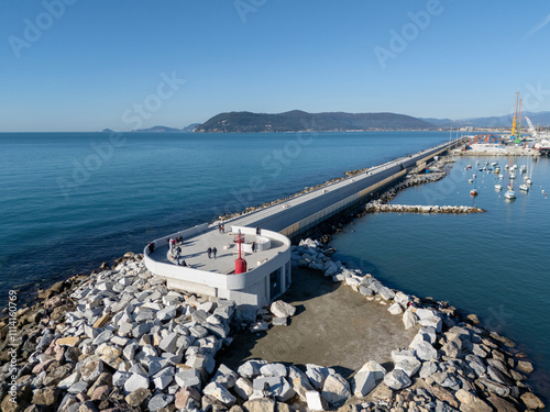 Aerial view of the new waterfront built on the breakwater of the commercial port of Marina di Carrara, in Tuscany