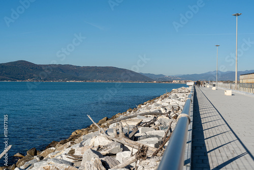 glimpse of the new waterfront built on the breakwater of the commercial port of Marina di Carrara, in Tuscany