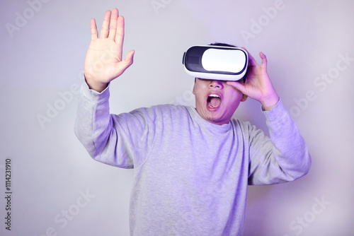 A man uses VR glasses to control a 3D image. Spatial Computing. photo