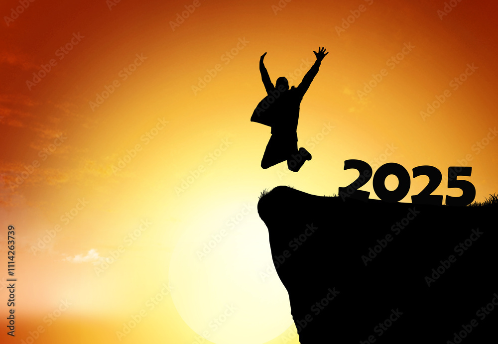 Silhouette of a person jumping joyfully at sunset while celebrating the arrival of 2025 Silhouette of a person jumping joyfully at sunset while celebrating the arrival of 2025