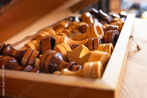 Opened box with chess pieces inside