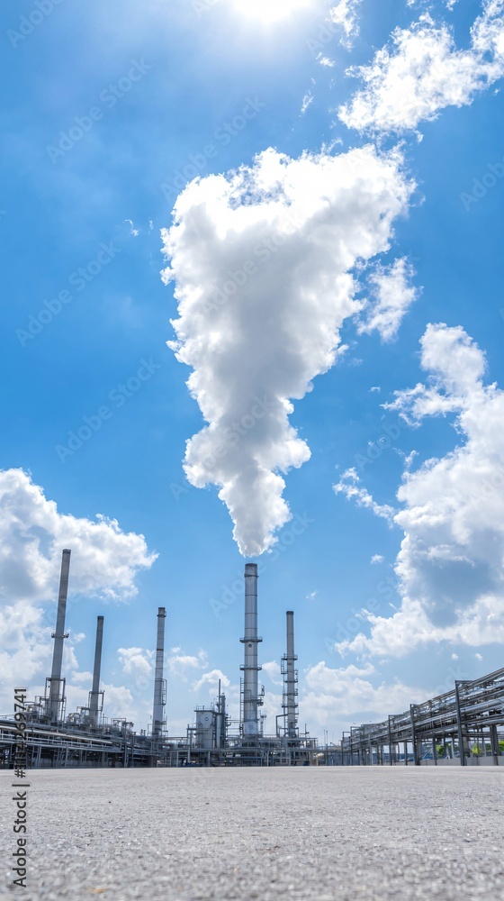 Renewable energy hydrogen. Industrial landscape with smoke stacks Renewable energy hydrogen. Industrial landscape with smoke stacks