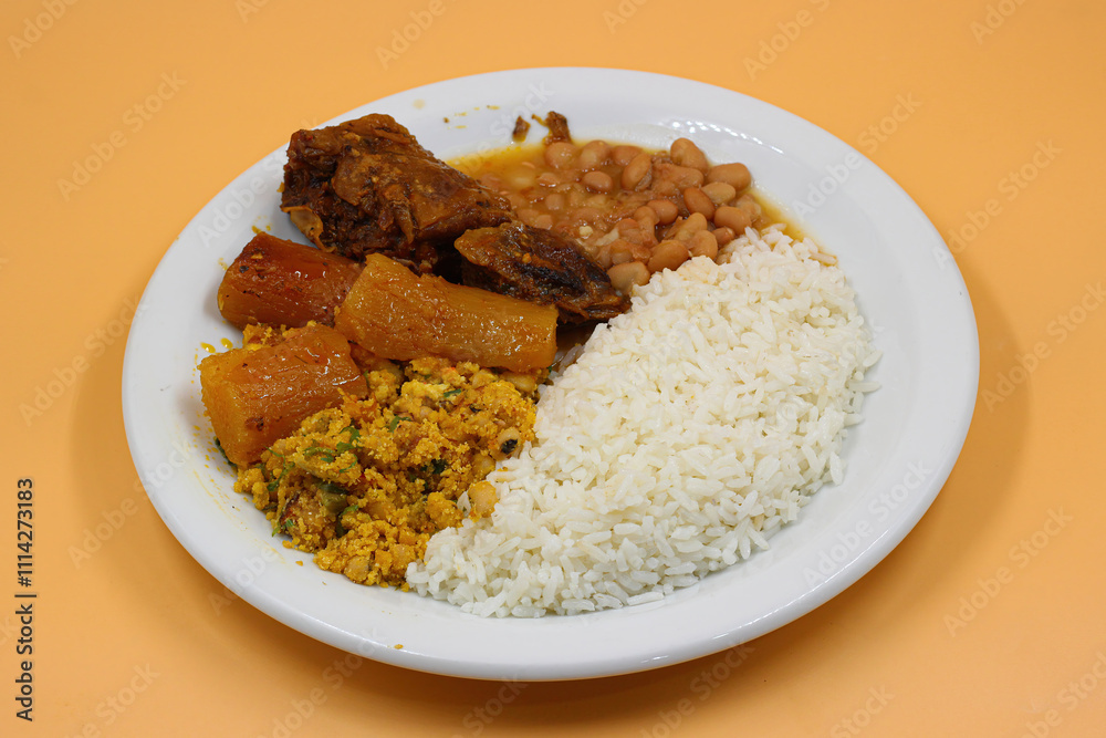 Ribs with cassava, farofa, rice and beans Ribs with cassava, farofa, rice and beans