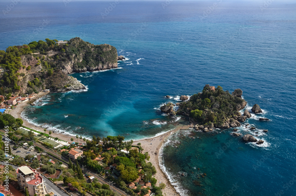 Naklejka premium View of the Ionian Sea and the island of Isola Bella from the viewpoints in Taormina, Sicily 