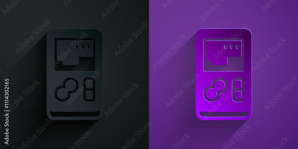 Paper cut Portable video game console icon isolated on black on purple background. Handheld console gaming. Paper art style. Vector Paper cut Portable video game console icon isolated on black on purple background. Handheld console gaming. Paper art style. Vector