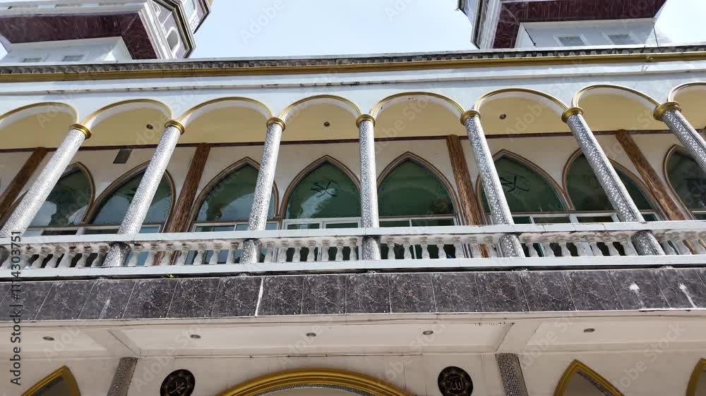 the loggia of a mosque with classic islamic architecture