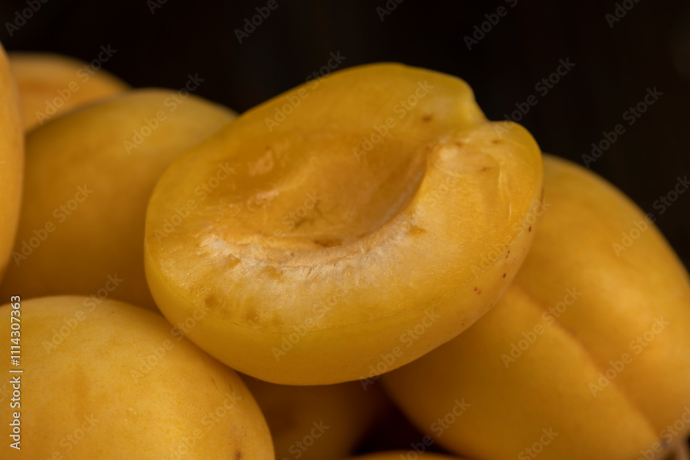 ripe soft apricot fruits on the cutting board ripe soft apricot fruits on the cutting board