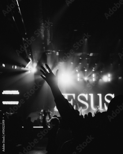 people raising their hands in worship at church