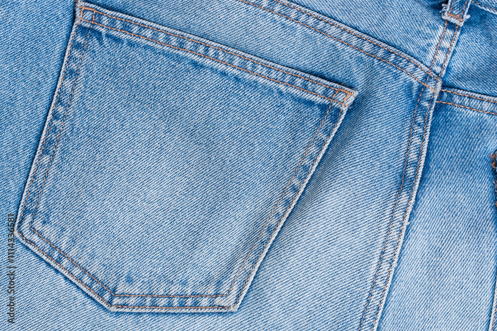 Fototapeta premium Back pocket of old, worn jeans.