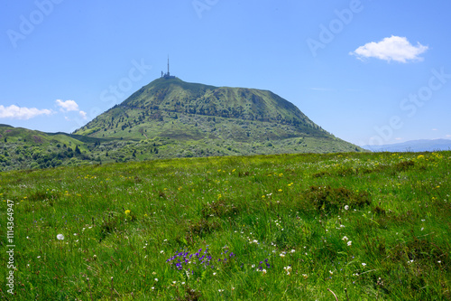 Woman Hiking in the Volcanic Landscapes of Auvergne, Puy de Dôme photo