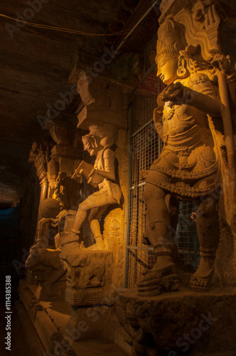 Carved sculpture of Hindu god and goddess at Meenakshi temple, Madurai, Tamil Nadu, India.