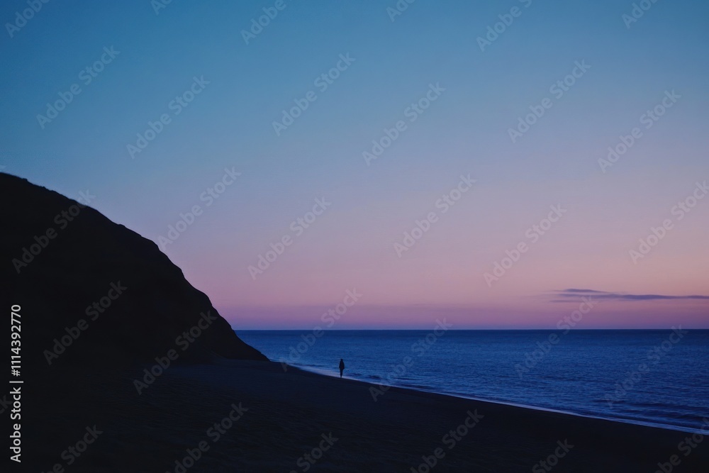 Obraz premium Solitary Figure Walking Coastal Beach Sunset