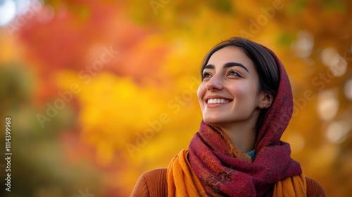 A woman wearing a scarf and covering her head, possibly for warmth or modesty