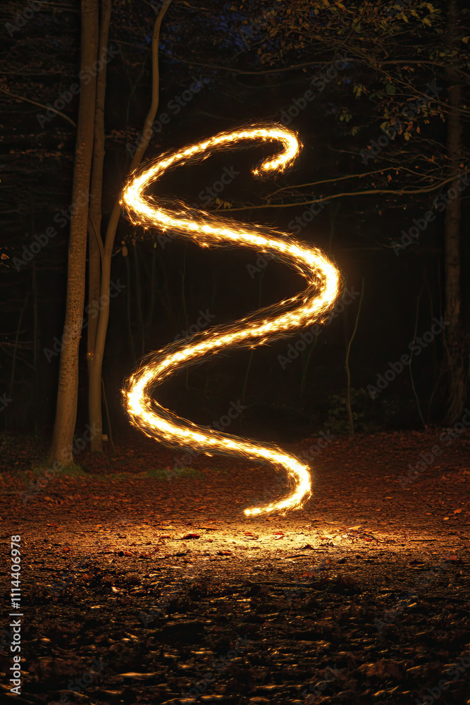 Obraz premium A skipping rope forming a figure-eight mid-air, glowing with energy