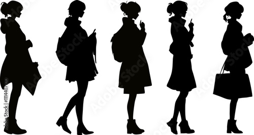 Five female shoppers walking and carrying shopping bags wearing winter clothes in silhouette