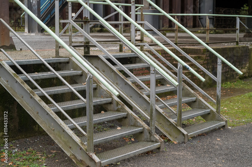 Принти на полотні Two metal industrial stairways leading to an abandoned factory