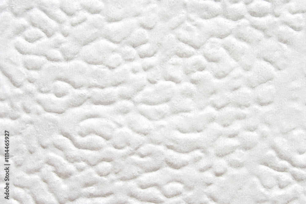 Close up texture of soft white cotton fabric with unique patterned surface. Close up texture of soft white cotton fabric with unique patterned surface.