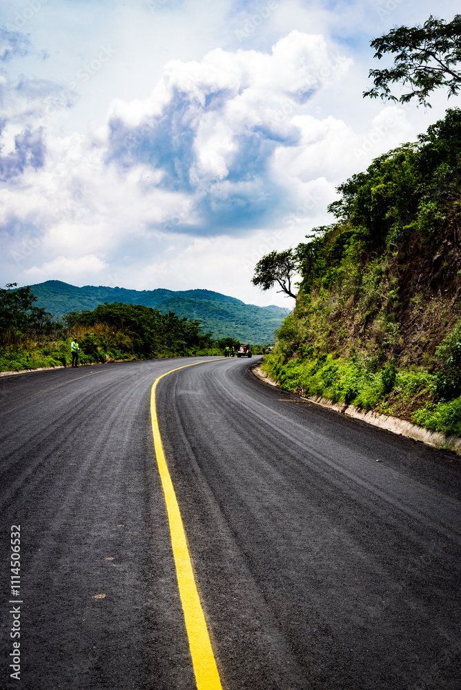 Curved road, natural landscape vertical shot Curved road, natural landscape vertical shot