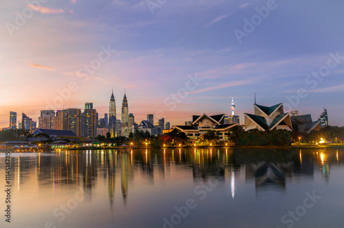 Canvas Print Skyline of Kuala Lumpur with its reflection in the pond, Kuala Lumpur, Malaysia