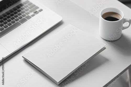 Customizable corporate brochure mockup placed in a business environment, suggesting a productive workday