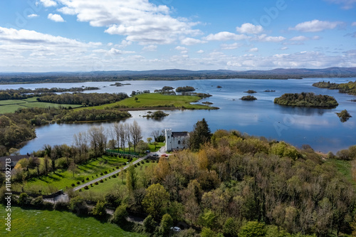 Wide high-angle aerial photograph of Cargin Castle on the shores of Lough Corrib photo