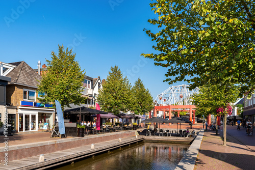 Shopping center of Drachten with canal on a sunny day in summer , Friesland, Netherlands photo