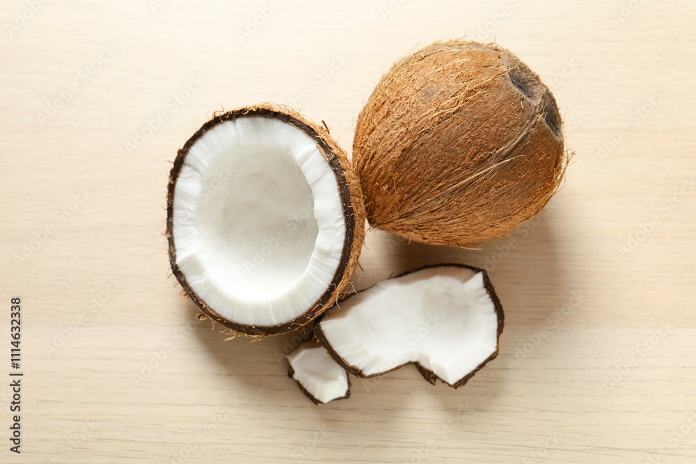 Coconut on wooden background, top view Coconut on wooden background, top view