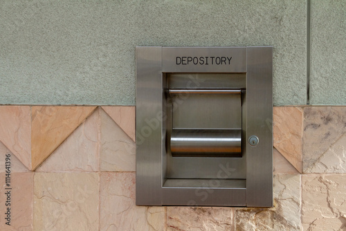 Valokuva Bank night depository box attached to a exterior wall
