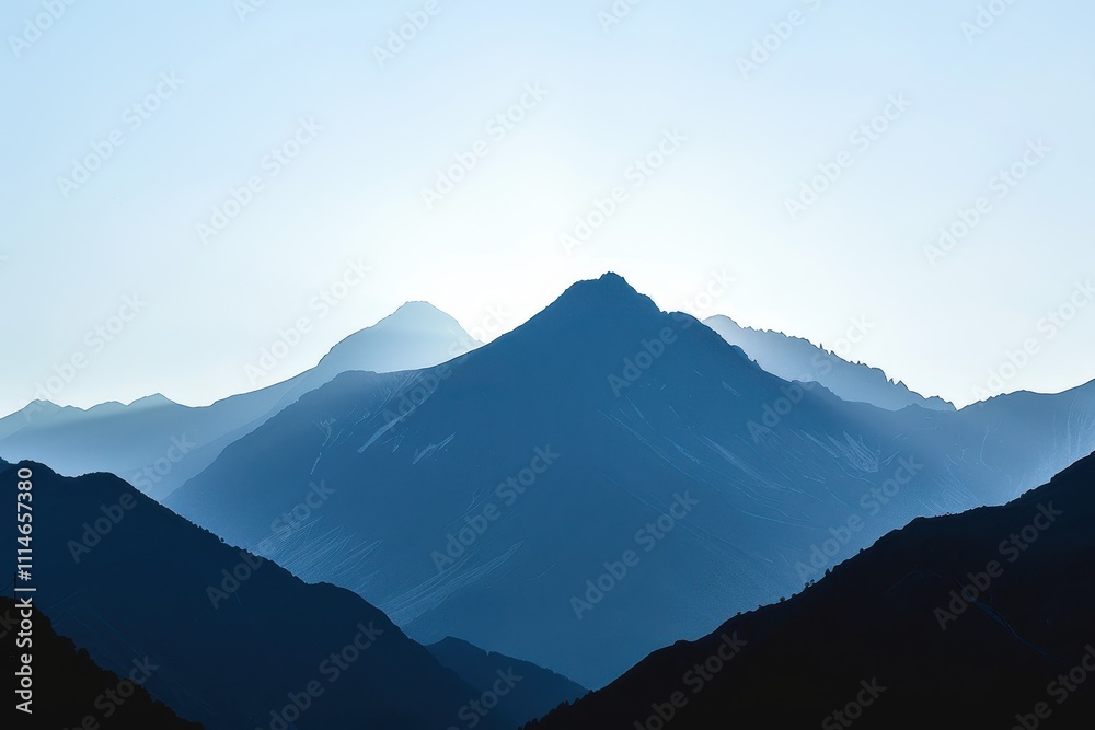Majestic mountain valley at dawn showcasing layered peaks, misty depths, and soft hues Majestic mountain valley at dawn showcasing layered peaks, misty depths, and soft hues