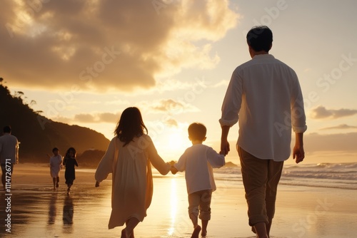 An idyllic scene of a family walking hand in hand along a beautiful beach during sunset, capturing family bonds, warmth, and the peacefulness of the seaside setting.