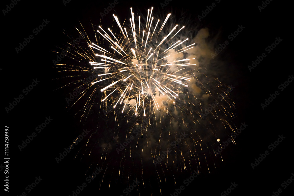 White yellow fireworks closeup in black background. White yellow fireworks closeup in black background.