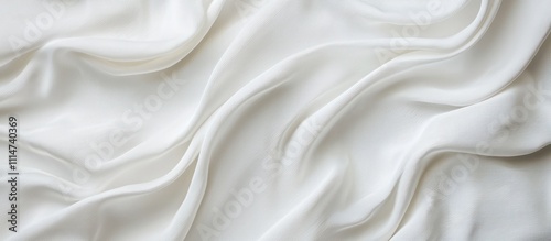Wavy white fabric texture on a clean background showcasing minimalist elegance
