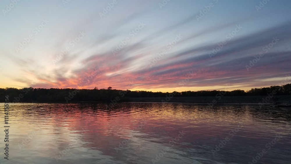 Fototapeta premium sunset over the river