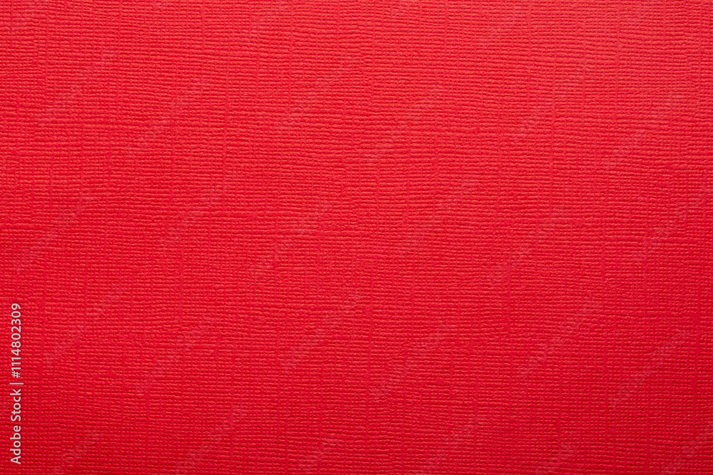 Fototapeta premium Red paper fabric texture. Red canvas embossed cardboard texture as a background